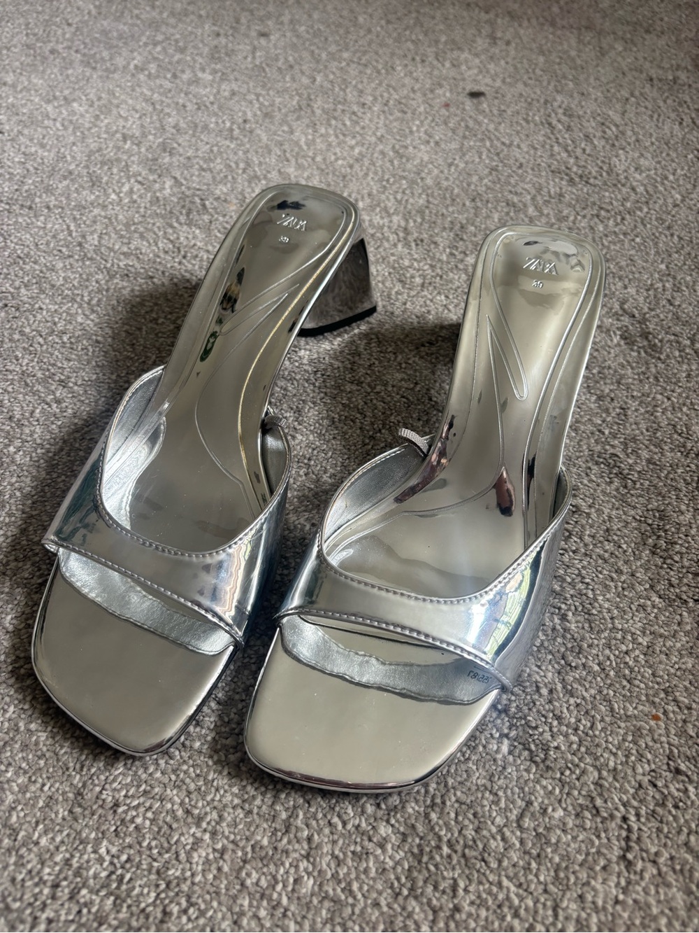 Silver chrome kitten heels